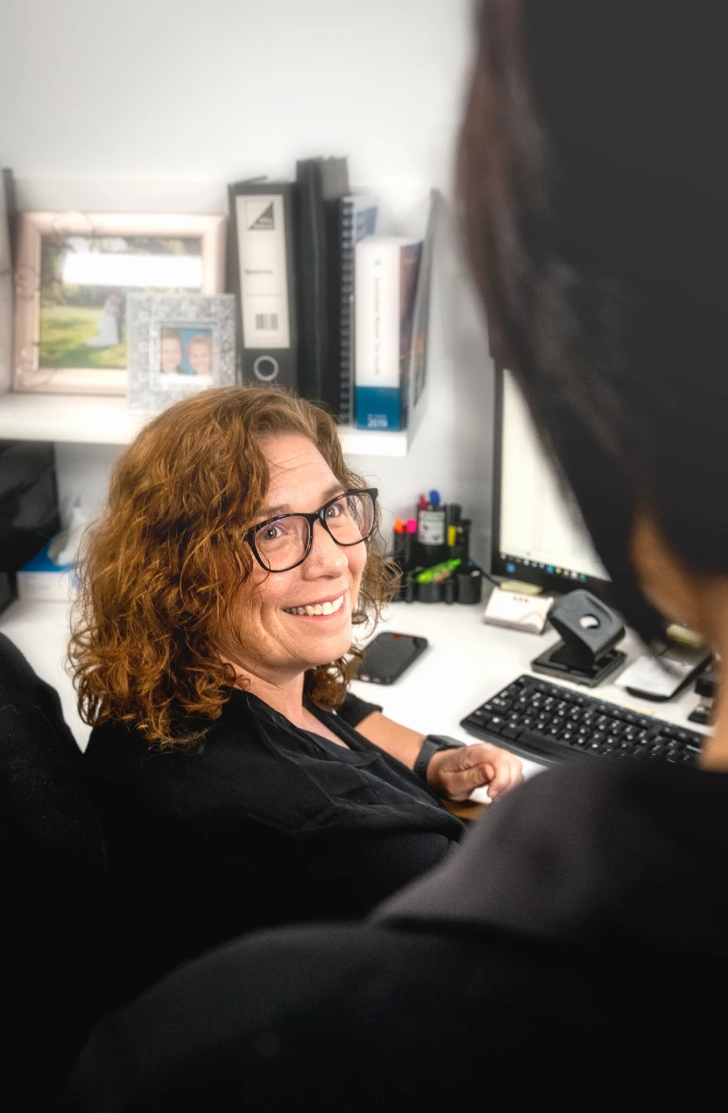 Image of an FAJ SMSF specialist helping a customer